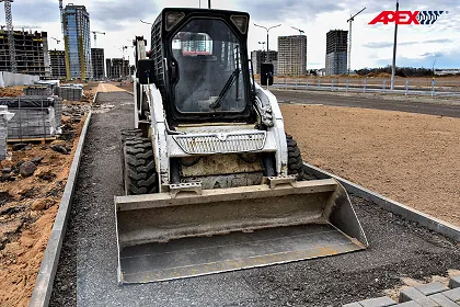 Skid Steer Loader: Solid Tires Best For Road Work